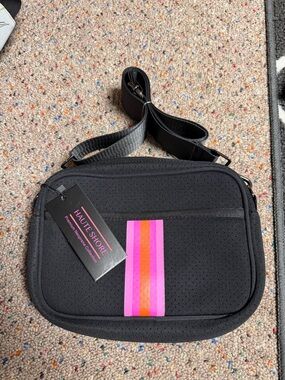 NWT HAUTE SHORE Black Crossbody with Pink and Orange Stripe Detail